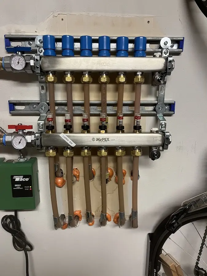 Plumber performing Gas Line Installation at a residential property in Carpentersville